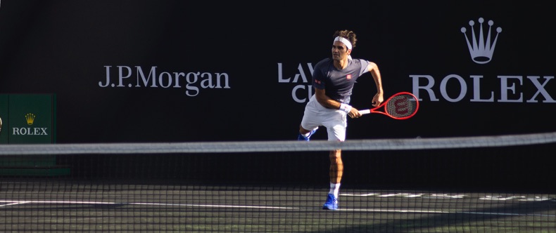Roger Federer follow through at the net